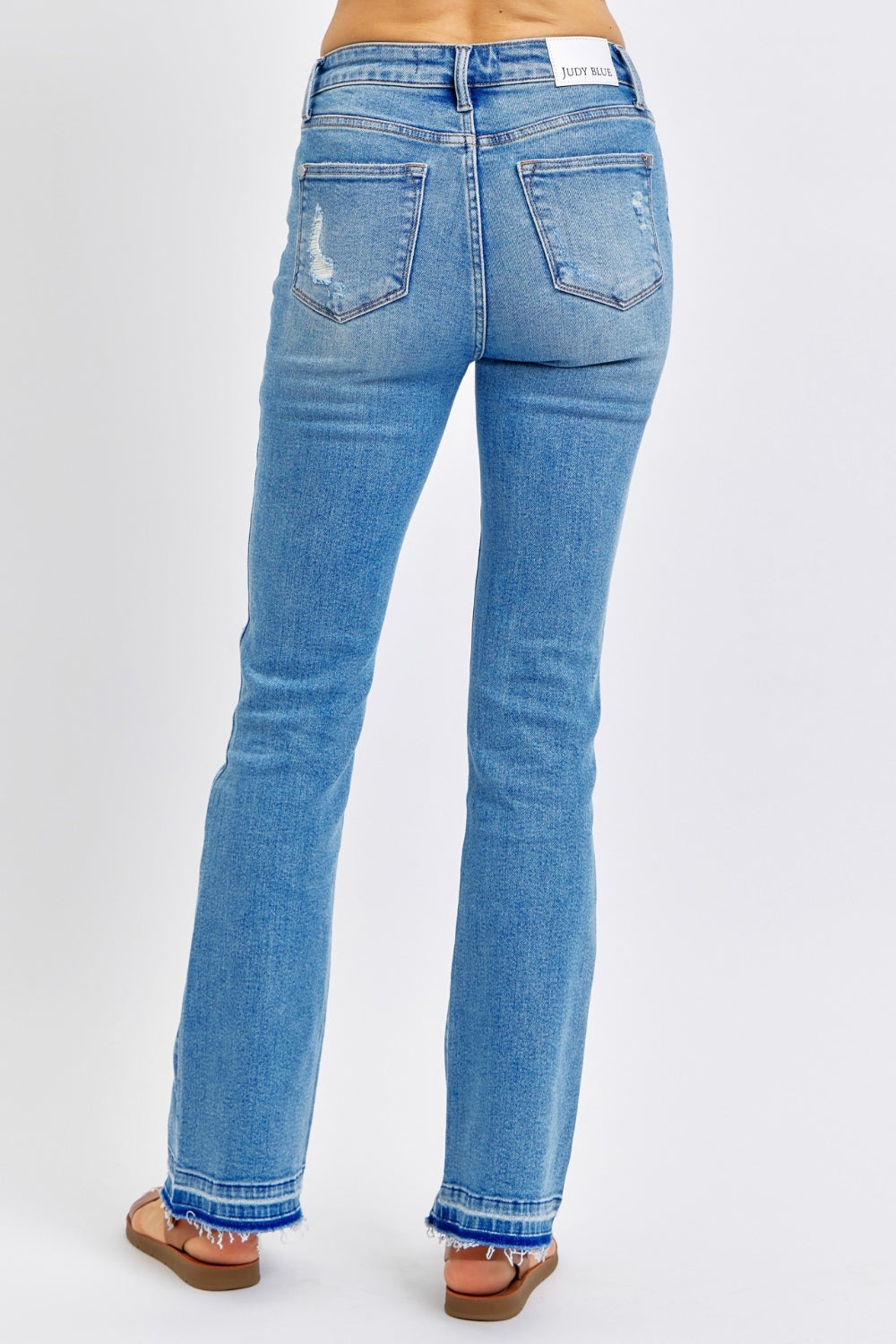 Judy Blue Full Size Mid Rise Destroyed Hem Distressed Jeans - RebelReine Apparel & Co.